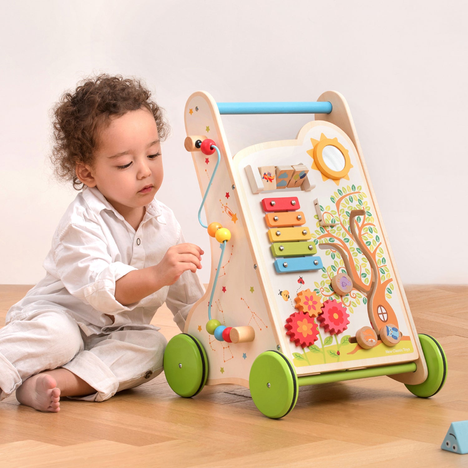 Lauflernwagen Lernlaufhilfe aus Holz mit Formsortierer und Zahnräder