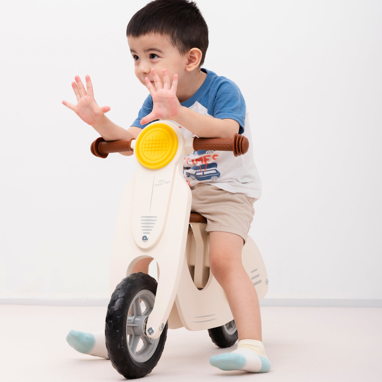 Laufroller aus Holz Kinder Rutscher Creme Laufrad Holzrad Holzroller